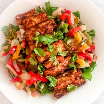 Prepared Tofu with Salad -- Fajita Edition in a bowl.