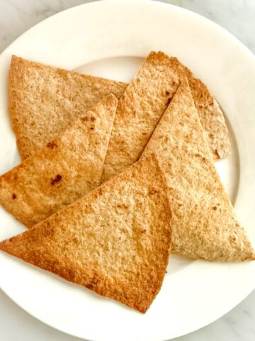 a plate of whole wheat baked tortilla chips