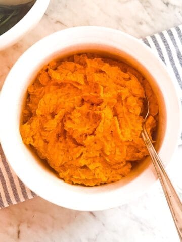 Creamy roasted gluten free sweet potato casserole for a healthy Mediterranean Diet Thanksgiving recipe or dairy free sweet potato casserole side dish.