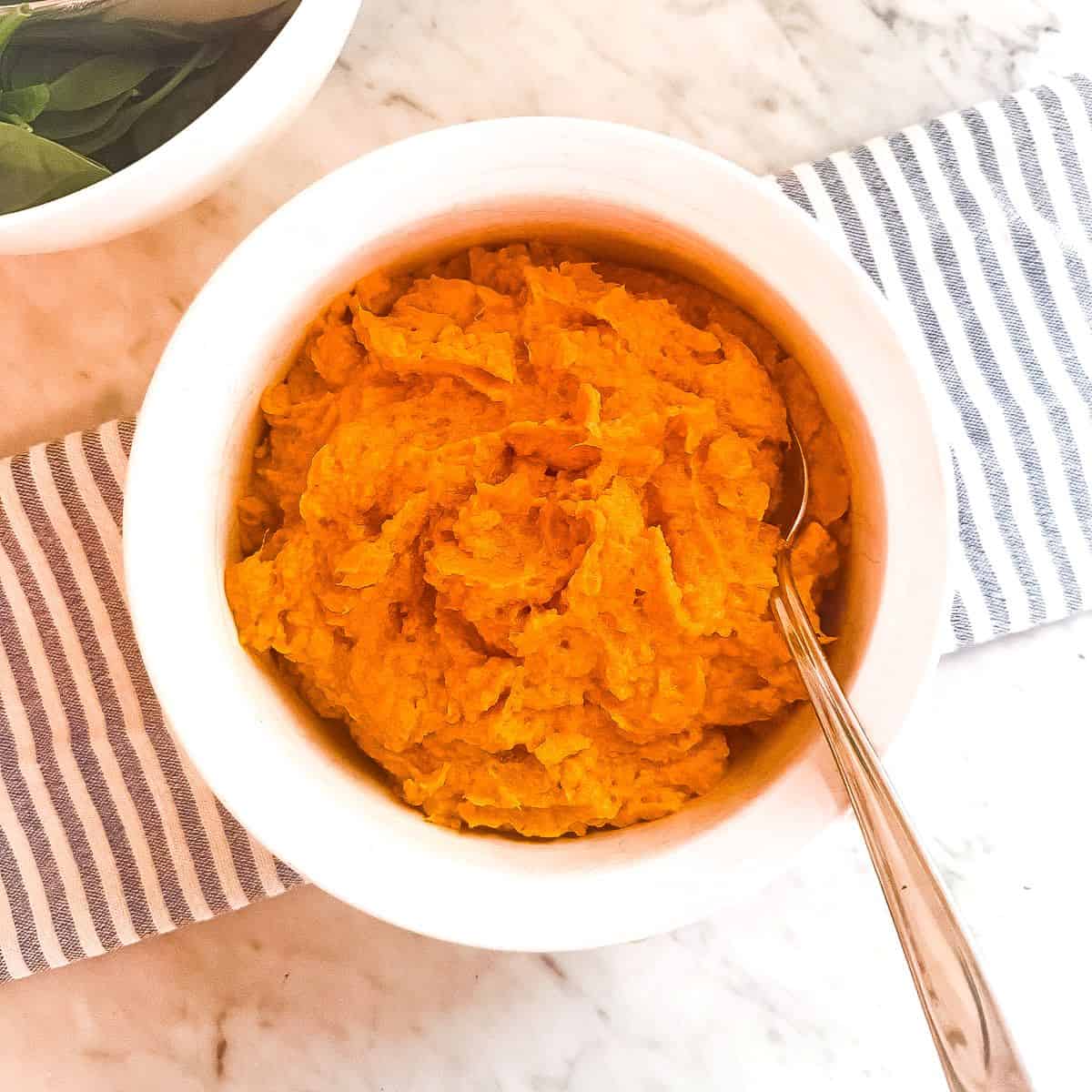 Creamy roasted gluten free sweet potato casserole for a healthy Mediterranean Diet Thanksgiving recipe or dairy free sweet potato casserole side dish.