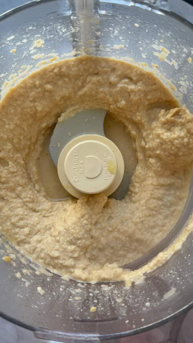 Mediterranean Diet Hummus being prepared in a food processor
