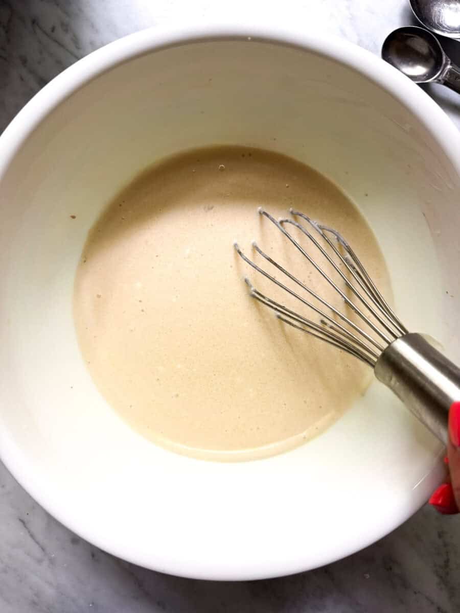 Wet muffin ingredients whisked until smooth and no Greek yogurt lumps remain