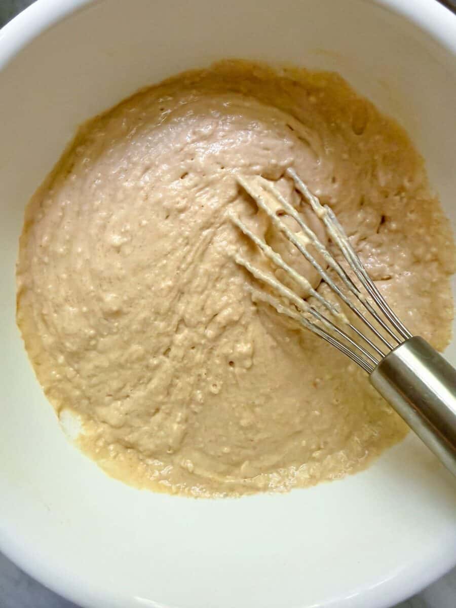 High protein blueberry muffin batter before blueberries are added. Wet ingredients and dry ingredients mixed together.